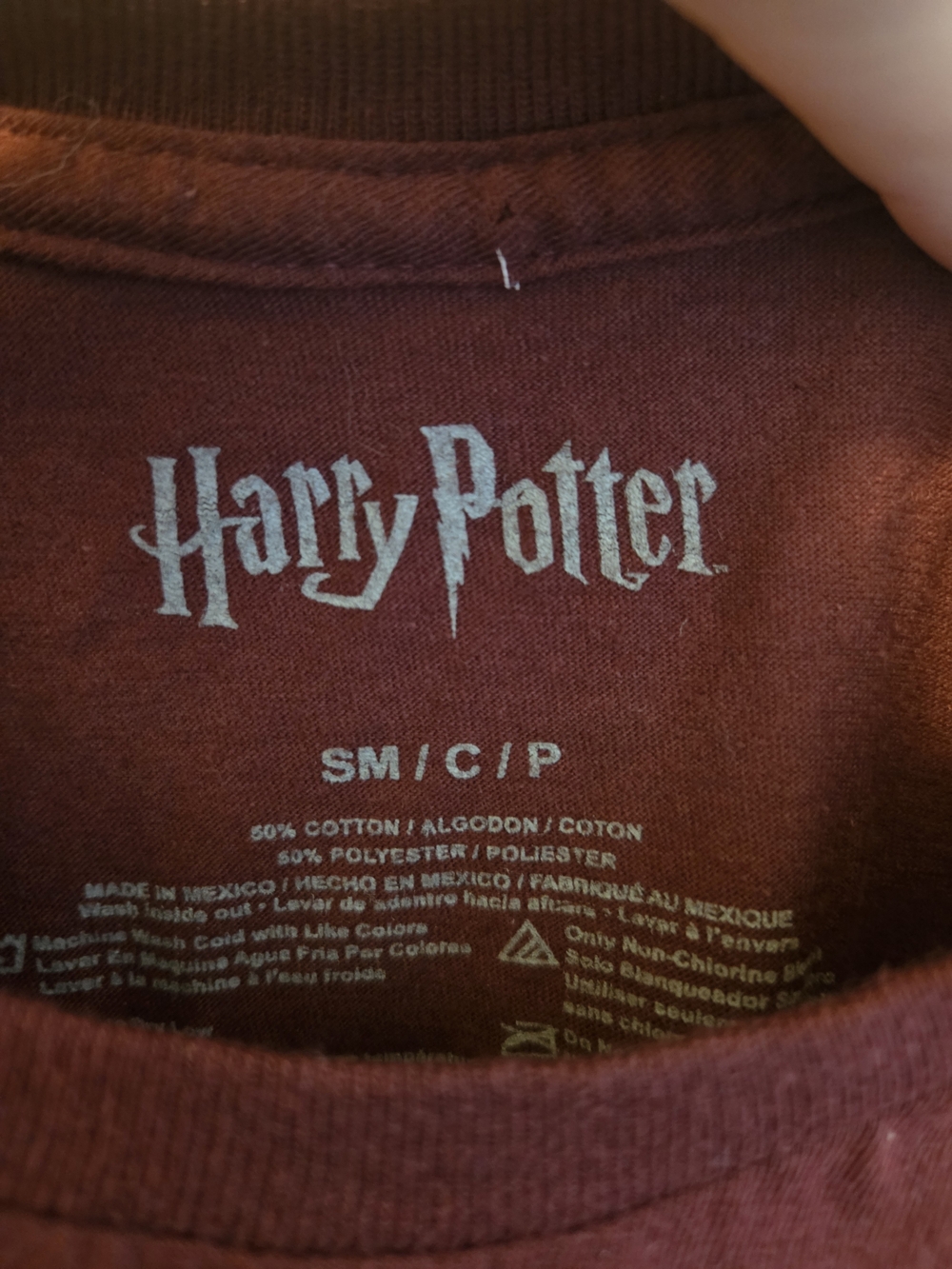 Warner Bros. Hogwarts Alumni Short Sleeve Tee in Maroon and Yellow - Picture 2 of 3